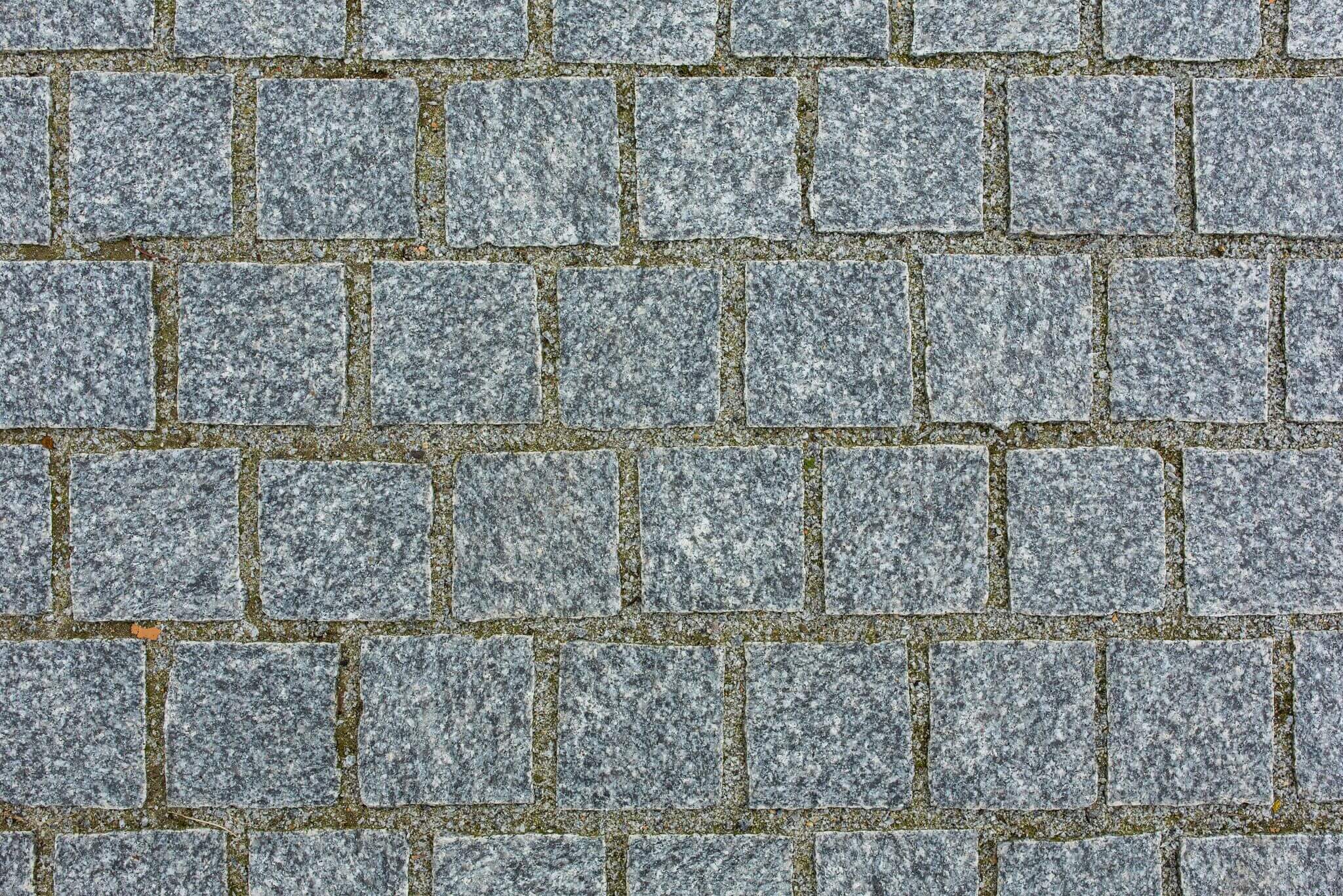Granit Edelkleinpflaster 10x10x8 cm hellgrau Detail 3